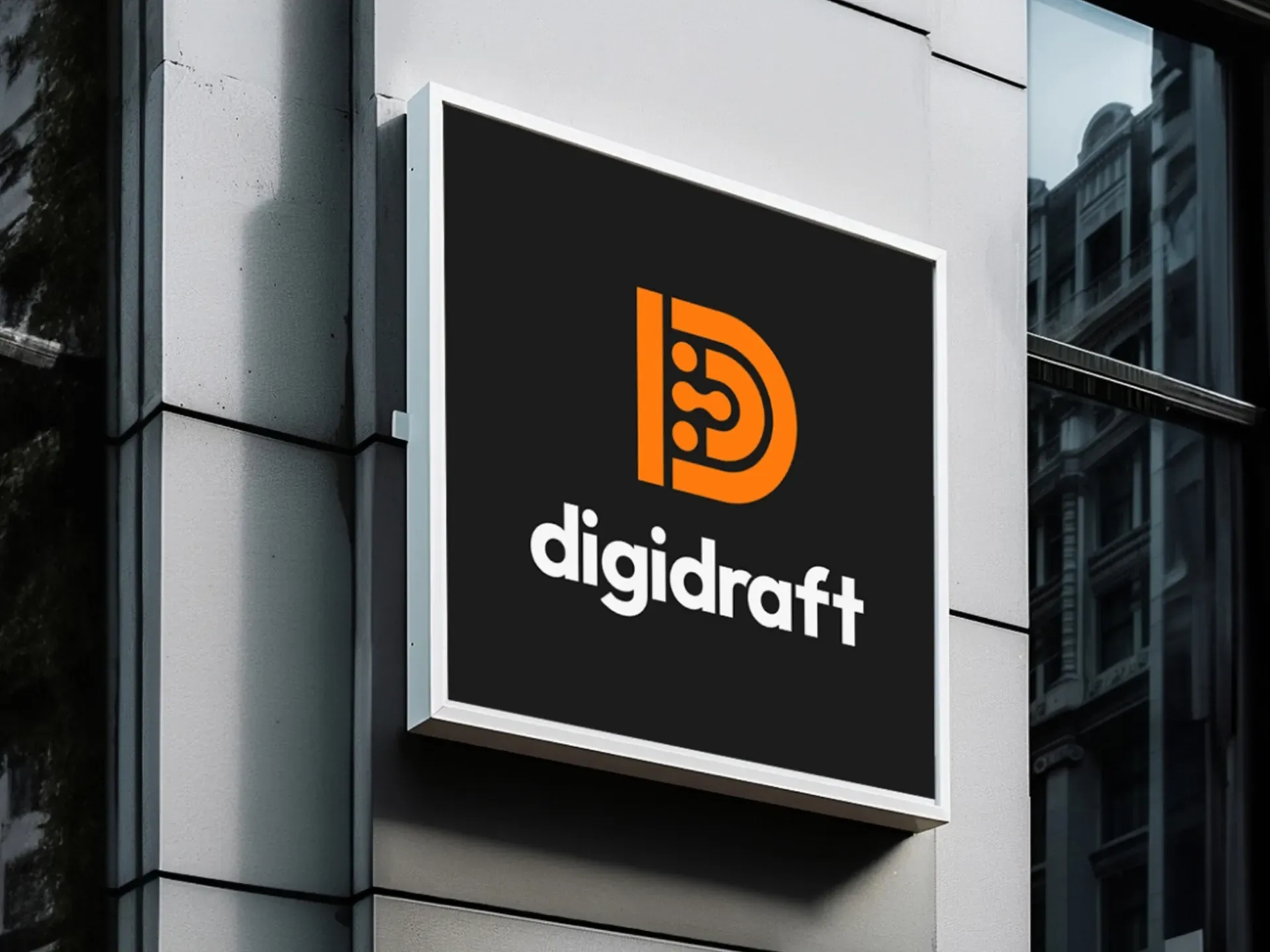 Logotyp agencji marketingowej DigiDraft umieszczony na ścianie wieżowca